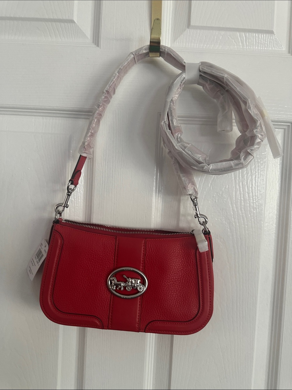 Coach Red Pebbled Leather Crossbody with Silver Horse & Carriage Emblem